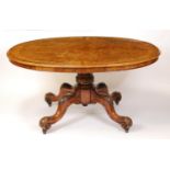 A mid-Victorian figured walnut and floral satinwood inlaid oval pedestal tilt-top breakfast table,