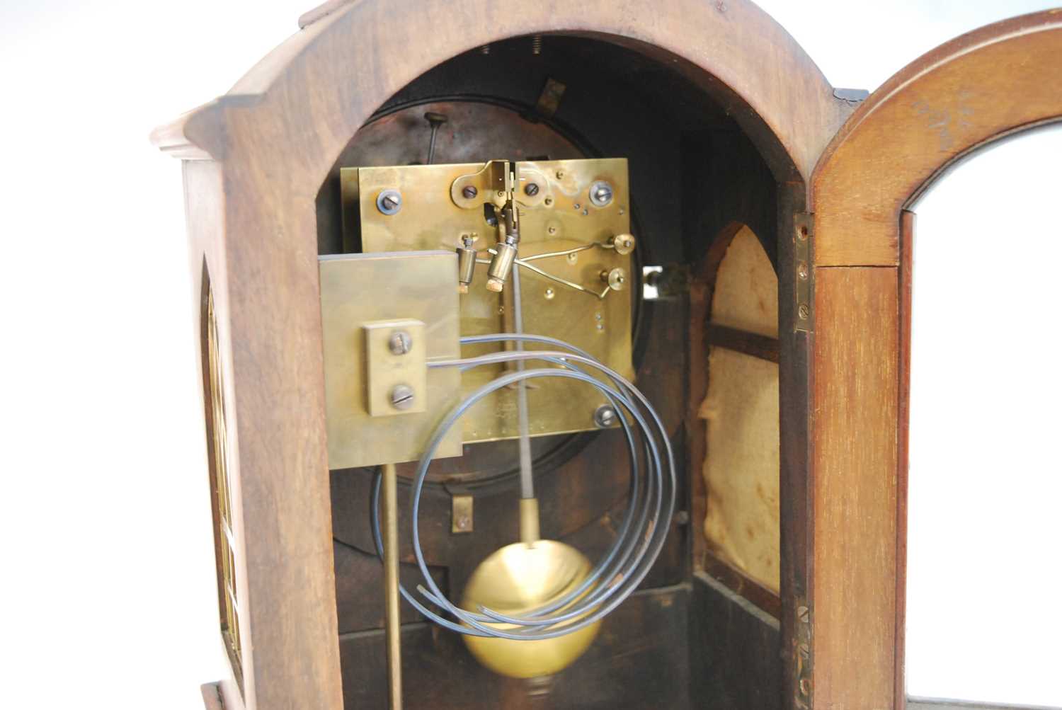 An early 20th century mahogany and brass mounted bracket clock in the Georgian style, having an - Image 4 of 4