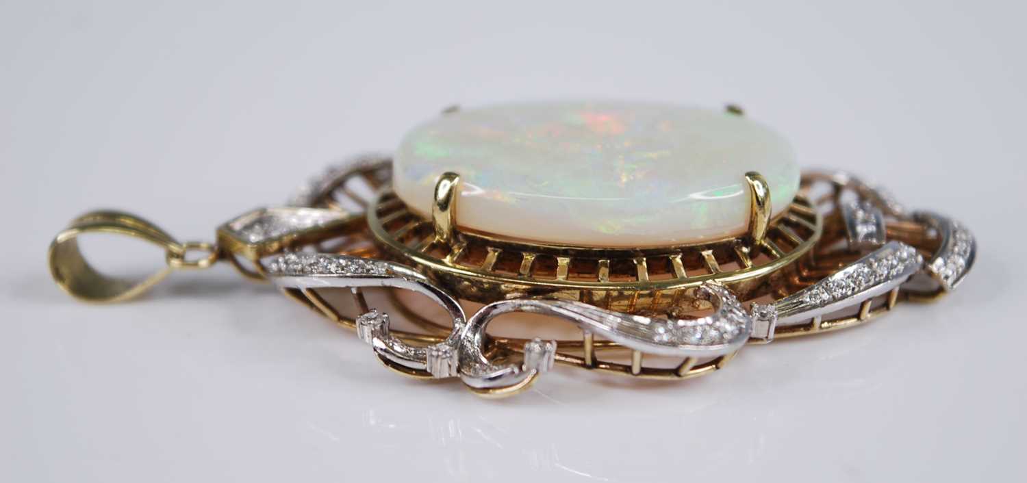 A yellow and white metal, opal and diamond openwork pendant, featuring a centre oval opal cabochon - Image 3 of 5