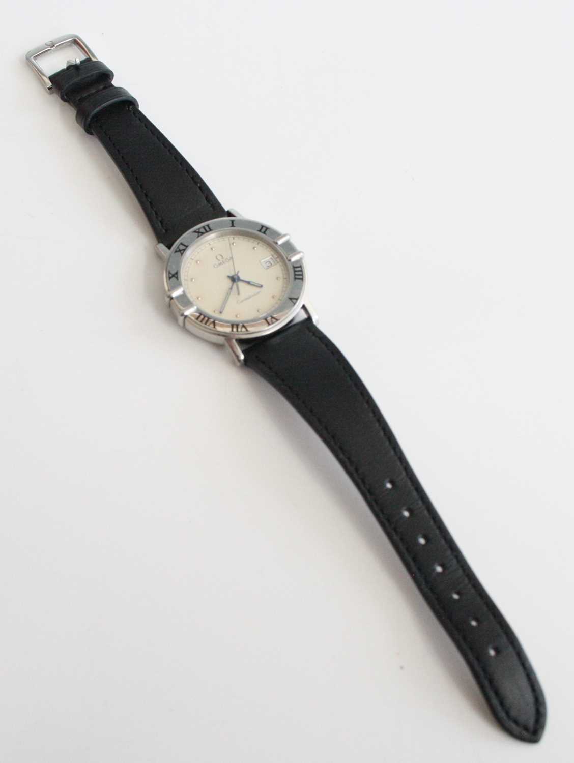 An Omega Constellation stainless steel quartz wristwatch, having a round cream dot dial and outer - Image 5 of 11