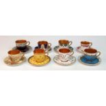 A collection of eight late 19th/early 20th century Coalport and Royal Worcester coffee cans and