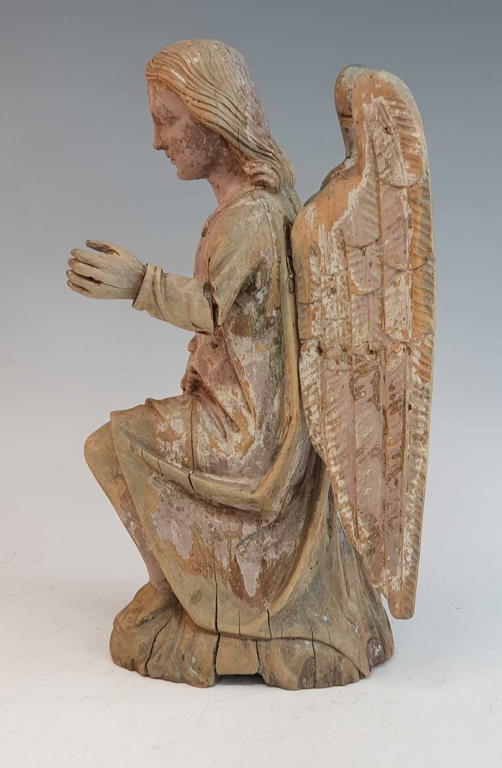 An 18th century carved pine figure of an angel, shown on one knee with arm outstretched, h.41cm Both - Bild 3 aus 3