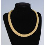 A contemporary Roberto Coin of Italy 18ct gold necklace, arranged as fine alternating ropetwist