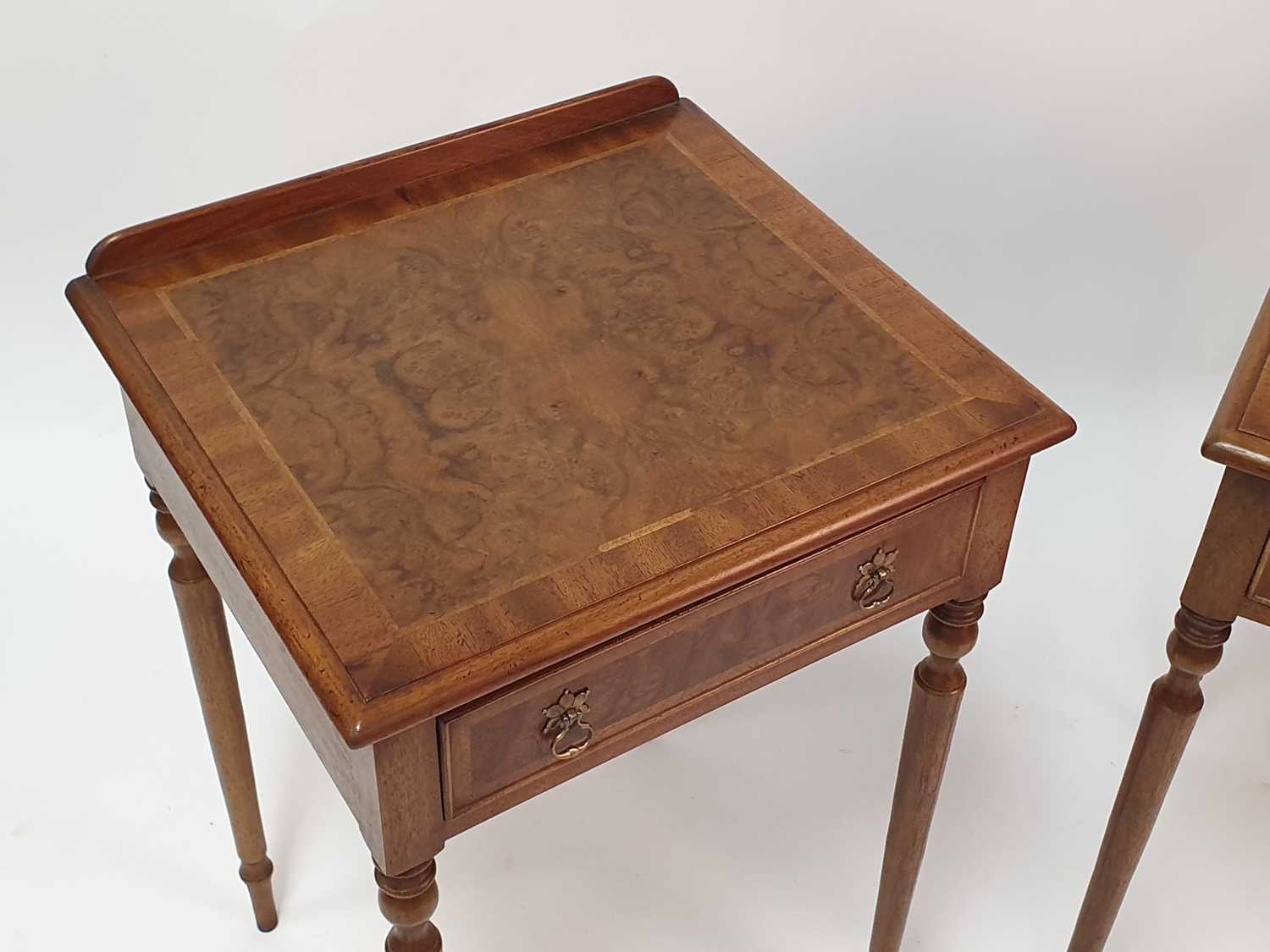 A pair of figured walnut and walnut lamp tables, each having four-quarter veneered cross and feather - Image 2 of 4