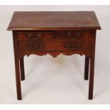 A George III mahogany and crossbanded lowboy, having configuration of two short over single long