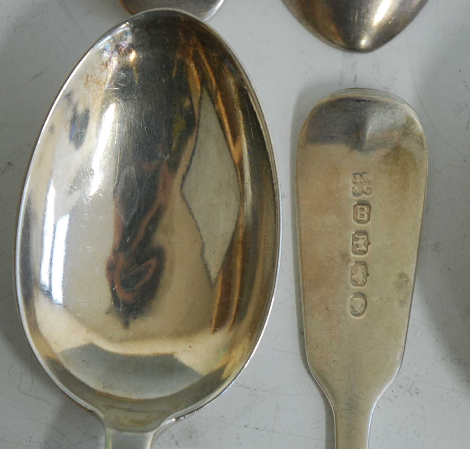 A collection of seventeen 19th century silver dessert spoons, all in the Fiddle pattern with - Image 8 of 9