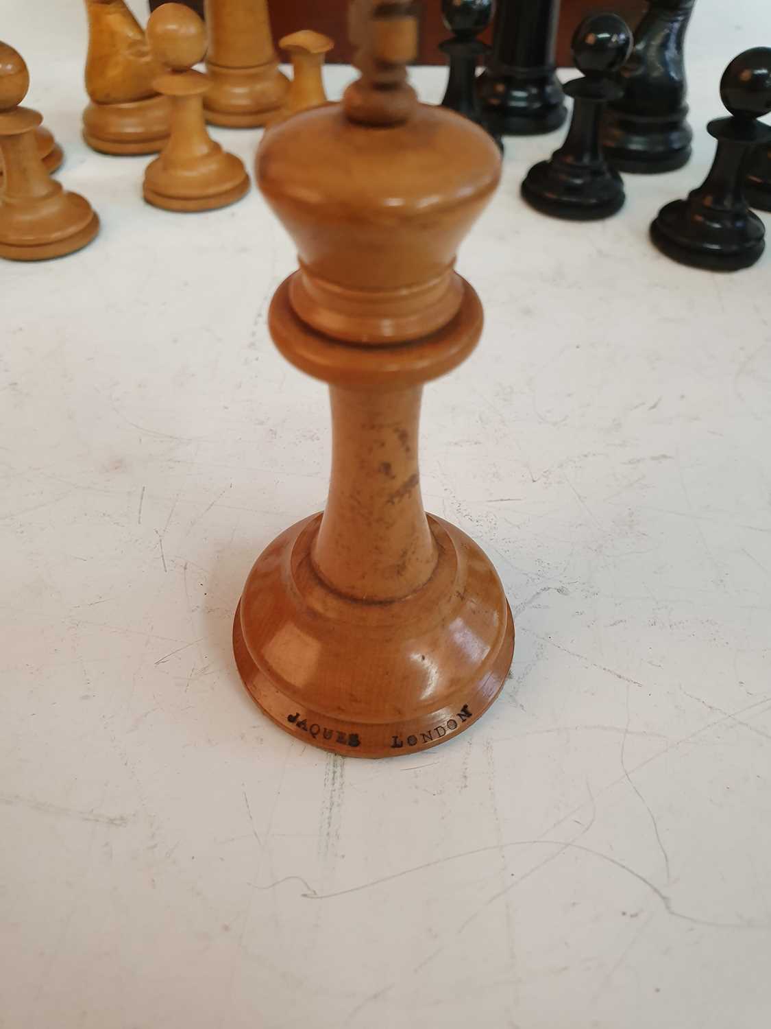 A late 19th century Jacques Staunton boxwood and ebony chess set, the rooks and knights bearing a - Image 3 of 12