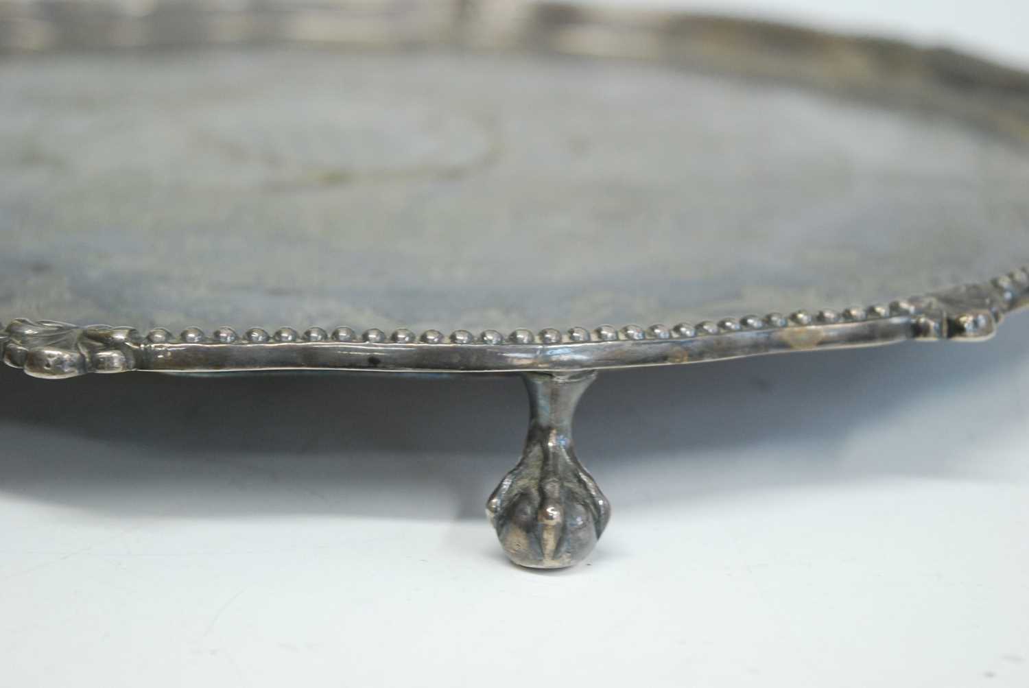 A Victorian silver presentation salver, of shaped circular form standing upon four claw and ball - Image 5 of 5
