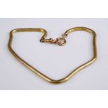 A yellow metal snake link bracelet, unmarked but tests as approx 18ct, with 9ct gold clasp, gross