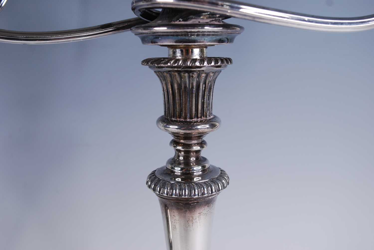 A pair of George III silver candlesticks, with matching plated three-light candelabra over, the - Image 2 of 4