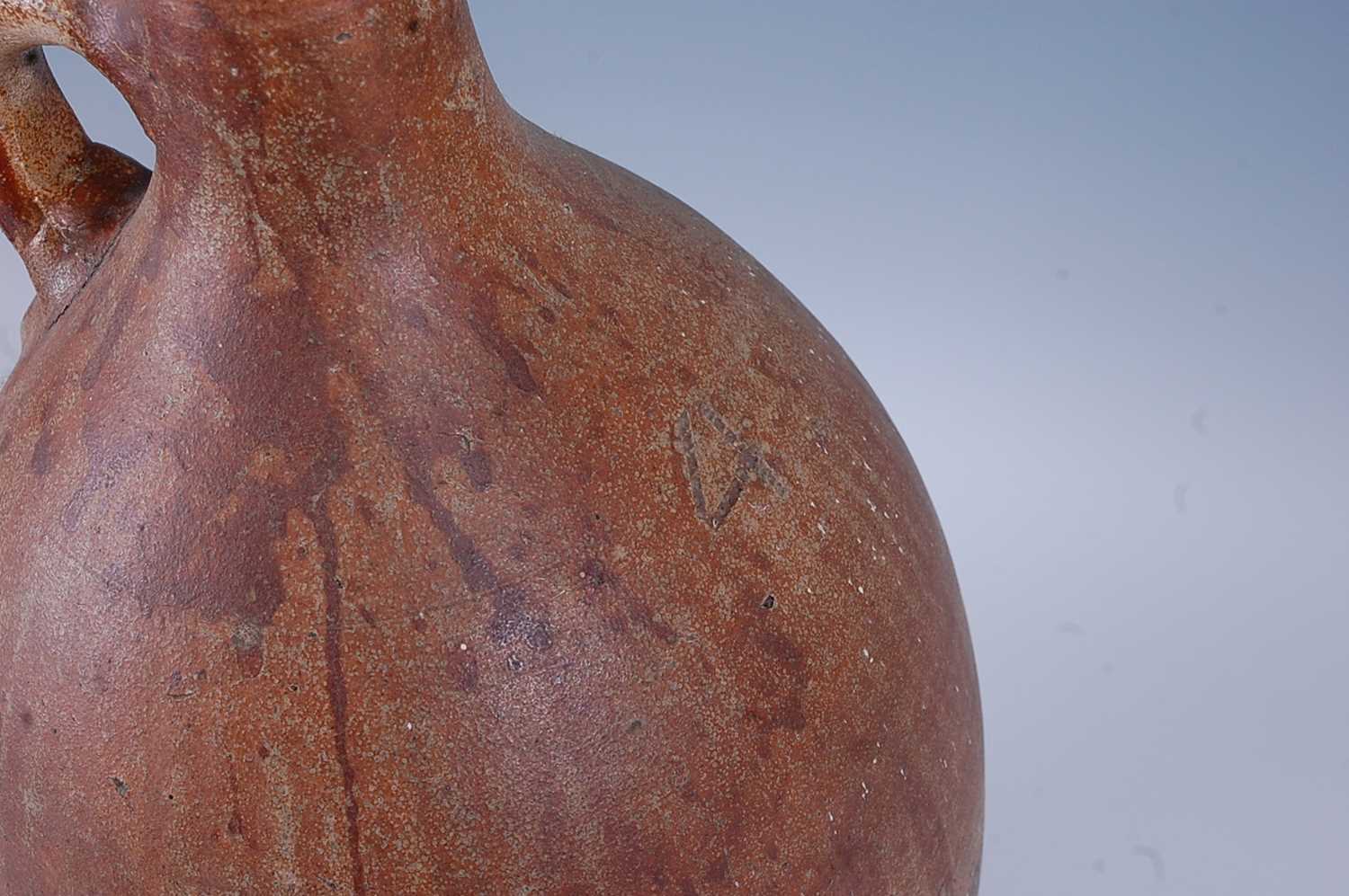 An early 18th century German salt glazed stoneware Bellarmine type flagon, of typical form, having a - Bild 6 aus 6