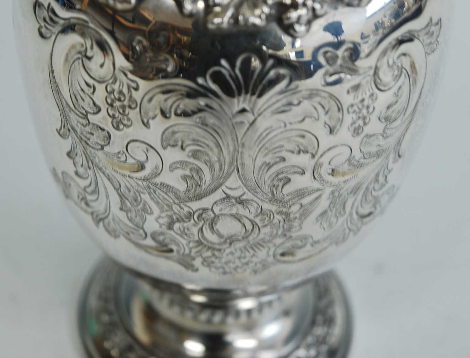 A Garrard & Co silver commemorative wine ewer for the Silver Wedding anniversary of Queen - Image 4 of 11