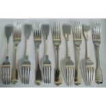 A matched set of ten 19th century silver table forks, all in the Fiddle pattern and six with