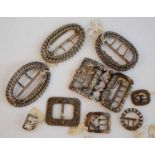 A collection of 18th century and later shoe and belt buckles, to include pair of oval ropetwist