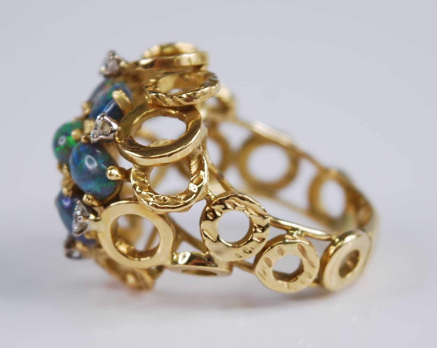 An 18ct yellow gold, opal and diamond bombe cluster ring, comprising seven opal cabochons - Image 3 of 7