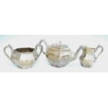 A 19th century Irish silver three-piece tea set, comprising teapot, sugar and cream, each piece of