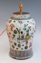 A 20th century Chinese Canton porcelain jar, of baluster form, enamel decorated in the hundred