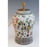 A 20th century Chinese Canton porcelain jar, of baluster form, enamel decorated in the hundred