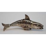 A 19th century Dutch silver reticulated fish spice box, the flexible body realistically cast with