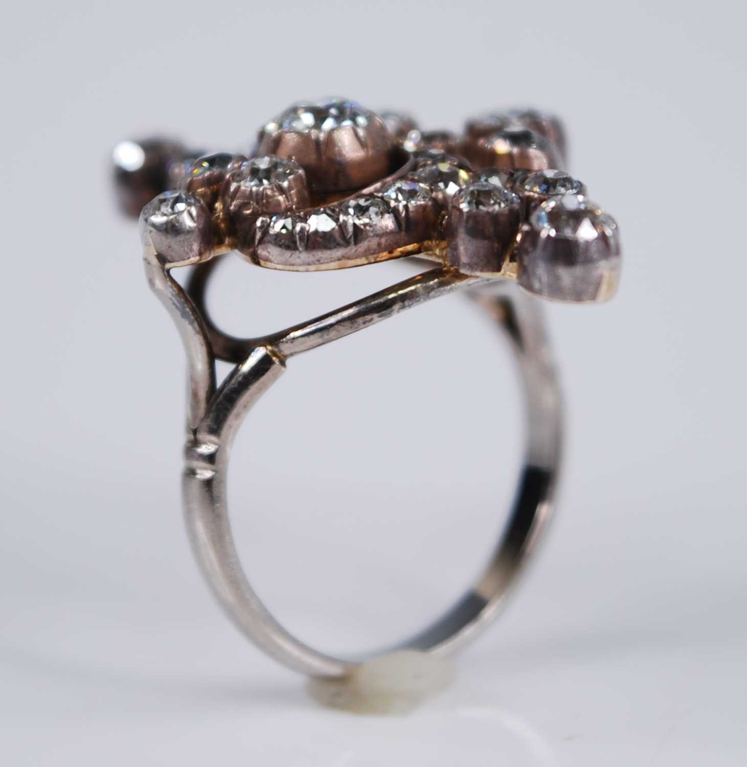 A white metal diamond openwork navette shaped cluster ring, comprising 30 Old European and rose - Image 3 of 4