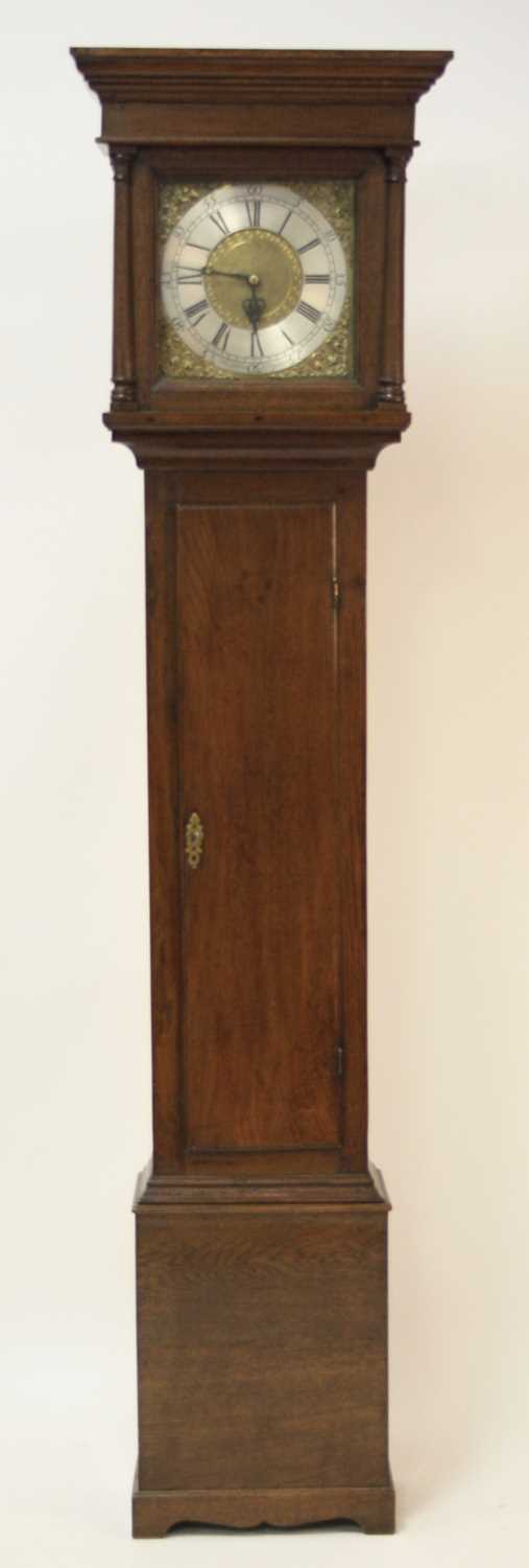 Thomas Akers of Collingbourn - a George III oak longcase clock, the 11" square brass dial having