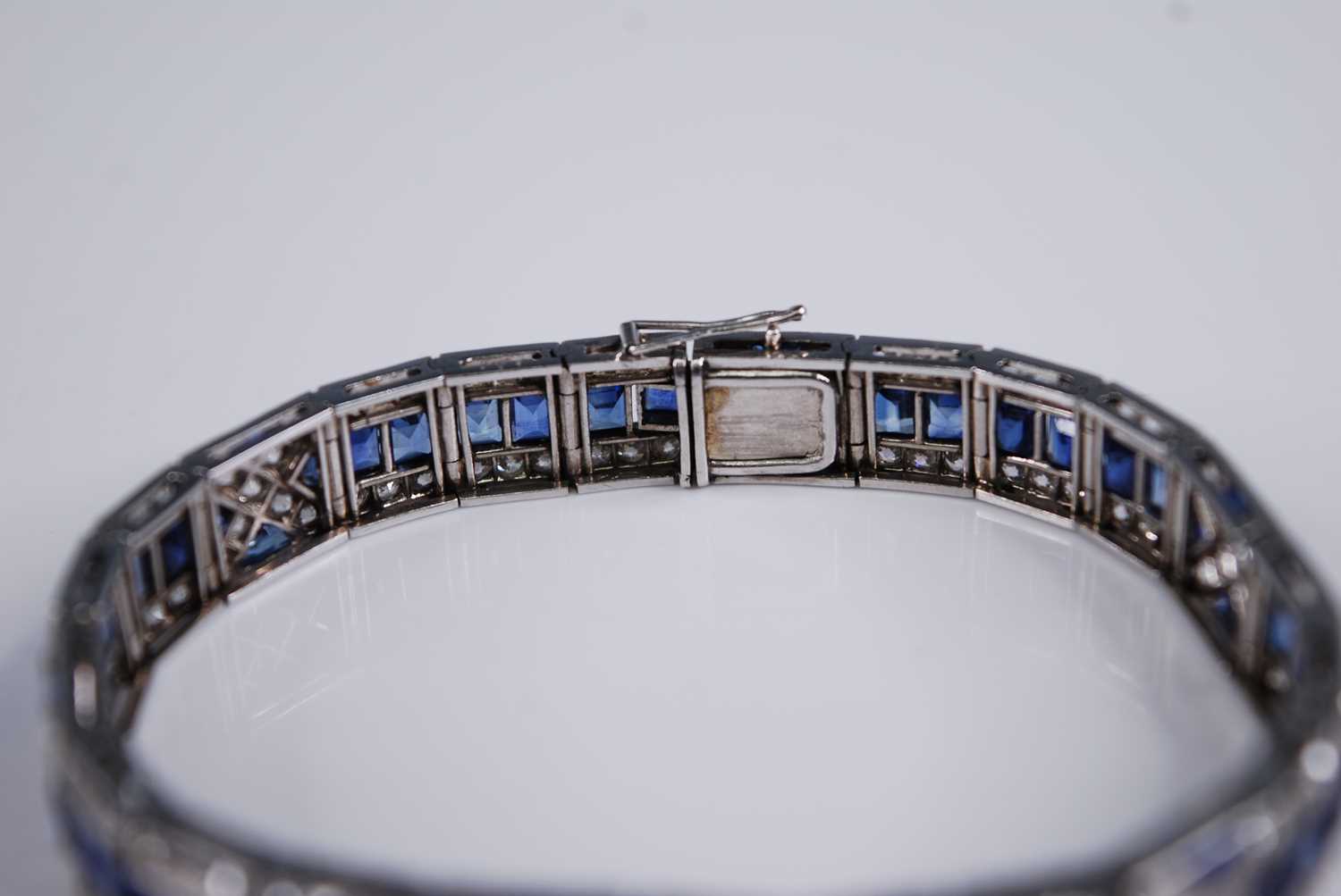 A white metal, sapphire and diamond Art Deco style articulated line bracelet, featuring 57 - Image 6 of 6