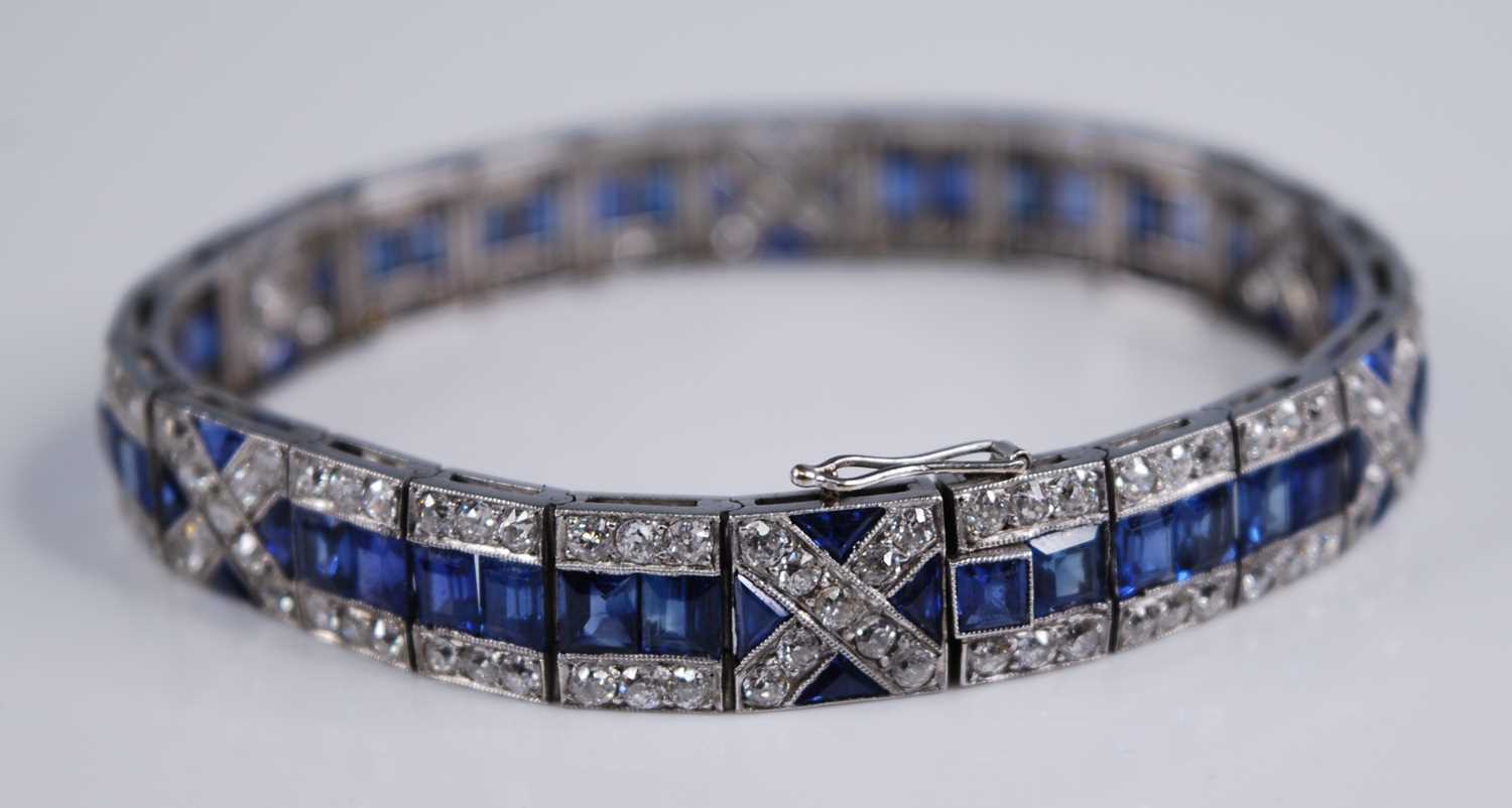 A white metal, sapphire and diamond Art Deco style articulated line bracelet, featuring 57 - Image 4 of 6