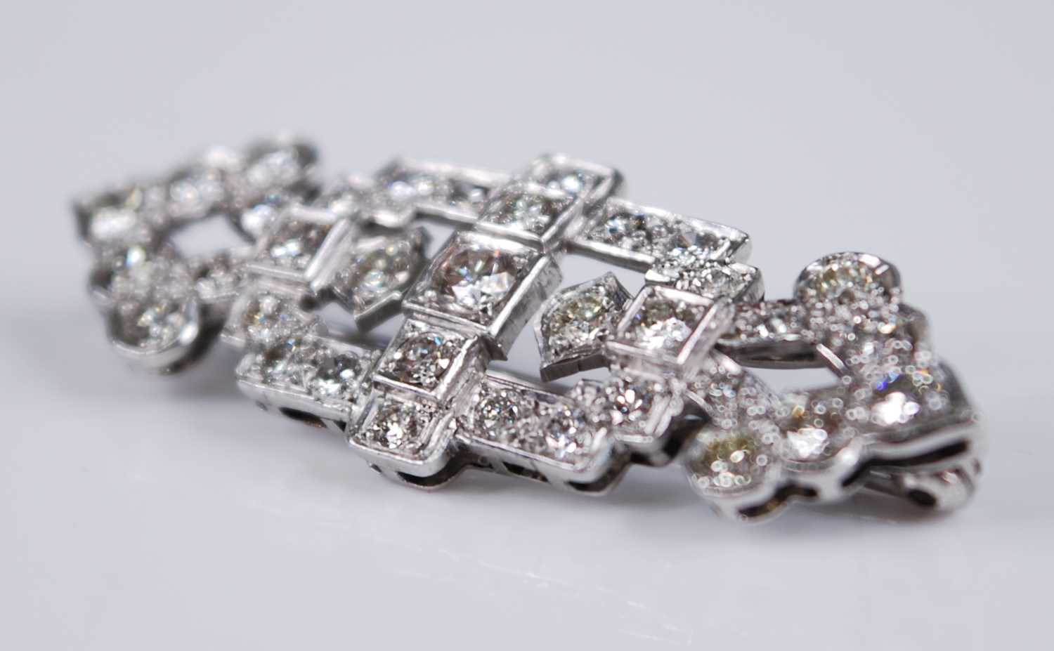 A white metal Art Deco diamond panel brooch, featuring 35 transitional brilliant cut diamonds in - Image 3 of 4