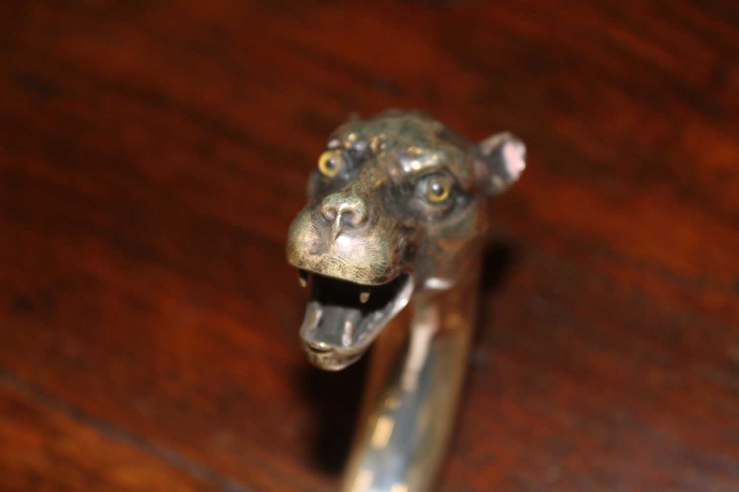 An early 20th century walking stick, the continental silver handle in the form of a leopard's - Image 11 of 14