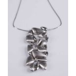A Miluna of Italy contemporary 18ct white gold and diamond set pendant, the abstract design of