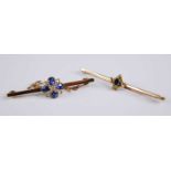 Two bar brooches, being a 9ct yellow gold, sapphire and diamond quatrefoil brooch, the four oval