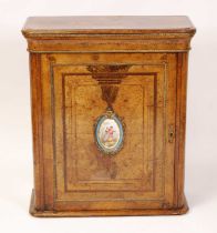 A mid-Victorian figured walnut round cornered pier cabinet, with flower head gilt metal detail,