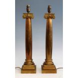 A pair of 20th century heavy brass table lamps, each in the form of an ionic column, h.55cm