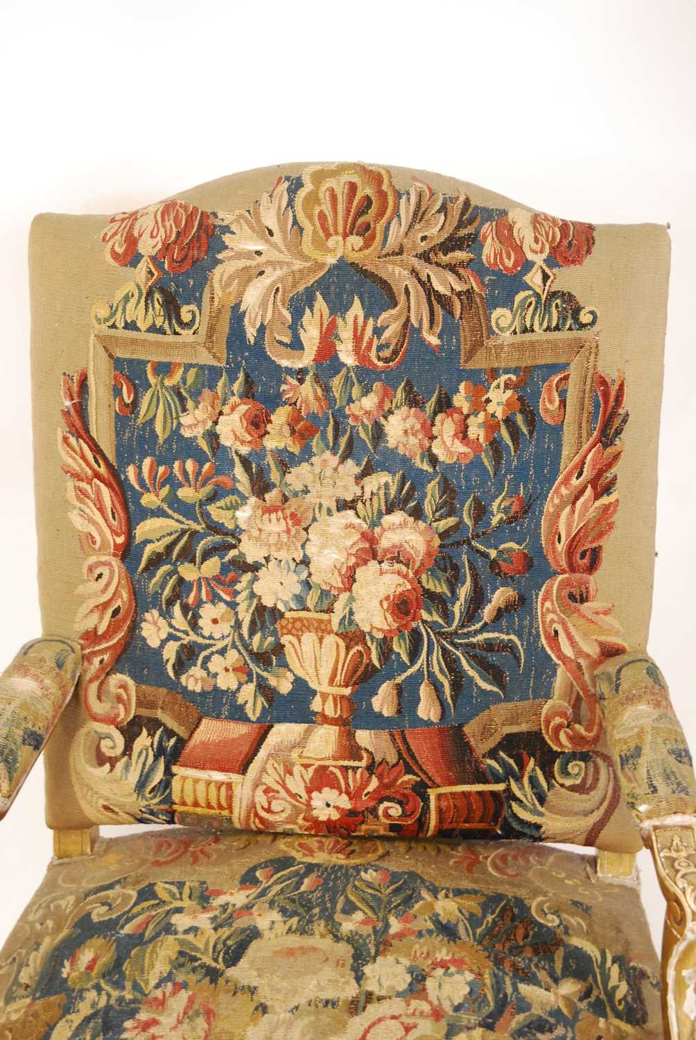 A 19th century French giltwood framed and needlework tapestry upholstered fauteuil, in the Régence - Image 2 of 7