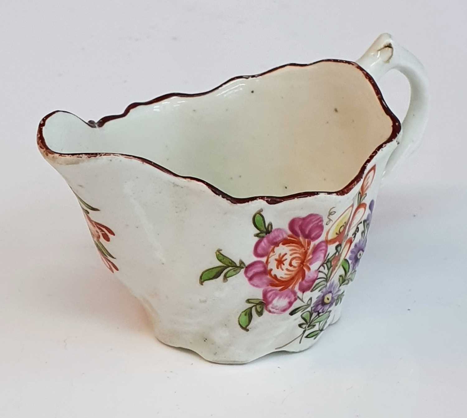 A circa 1780 Lowestoft porcelain 'Chelsea ewer' sauce boat, enamel decorated with flowers, h.5.5cm - Image 3 of 3