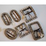 A collection of six Georgian and Victorian steel and paste set single shoe buckles, of rectangular