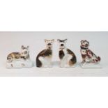 A pair of circa 1850 Staffordshire cats, each in seated pose, sponge decorated in ochre and brown,