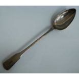 A Victorian silver serving spoon, in the Fiddle pattern with tree crest for the Wood family to the