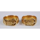 A Victorian 18ct gold belt ring, having leaf and flower carved decoration within lozenge panel,