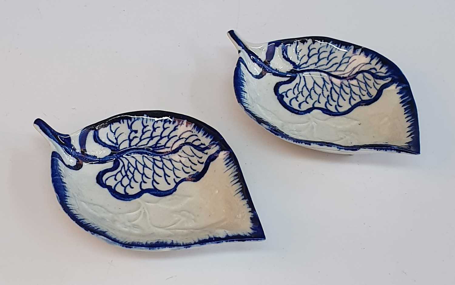 A pair of circa 1773 James Pennington of Liverpool porcelain pickle dishes, each in the form of