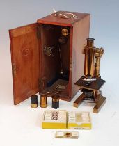 A 19th century Ross of London brass 'Eclipse' monocular microscope, on trunnions with lever,
