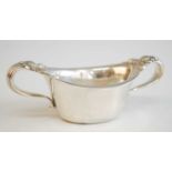 An early 20th century Tiffany & Co twin handled sugar bowl, of elliptical form with fruit embossed