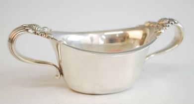 An early 20th century Tiffany & Co twin handled sugar bowl, of elliptical form with fruit embossed
