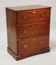 A late 19th century brass bound teak campaign chest, the three long drawers having flush brass