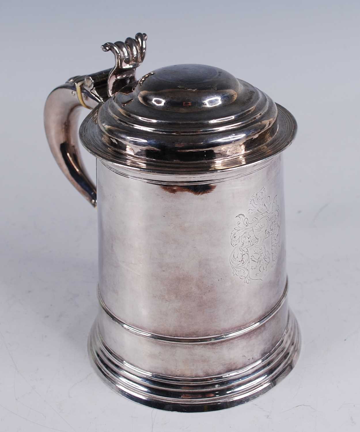 A George I silver lidded tankard, of flaring cylindrical form, the domed cover with scroll - Image 7 of 10