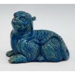 A 19th century Chinese turquoise glazed model of a tiger, shown in recumbent pose, h.14cm There is a