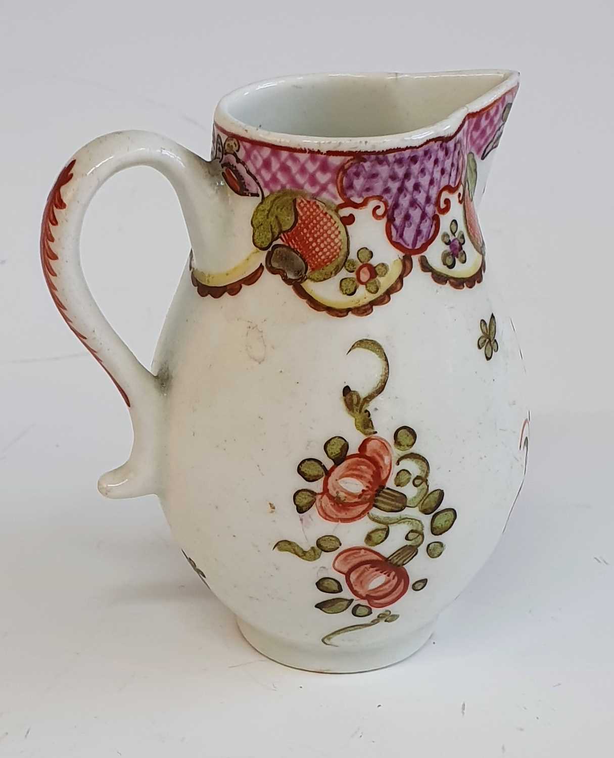 A circa 1780 Lowestoft porcelain sparrowbeak jug, enamel decorated with floral sprays below a diaper - Image 2 of 5