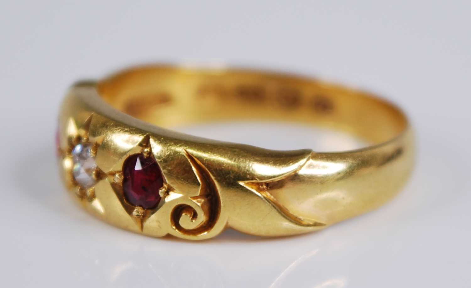 An Edwardian 18ct gold, ruby and diamond ring, the 'gypsy' set old round cut diamond weighing approx - Image 2 of 5