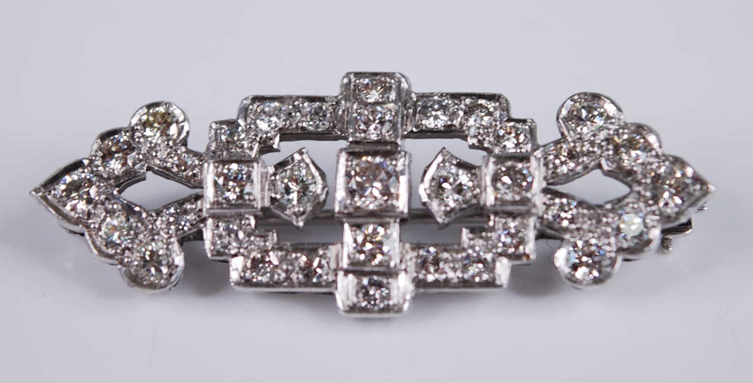 A white metal Art Deco diamond panel brooch, featuring 35 transitional brilliant cut diamonds in