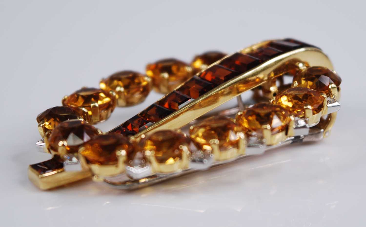 A yellow metal signed Cartier London citrine, topaz and diamond clip brooch, comprising a central - Image 6 of 11